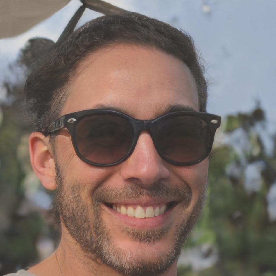 Professional headshot of Tomasz Górecki