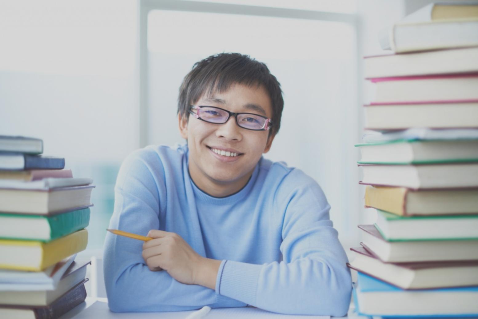 Finance professional reviewing quarterly variance analysis documentation